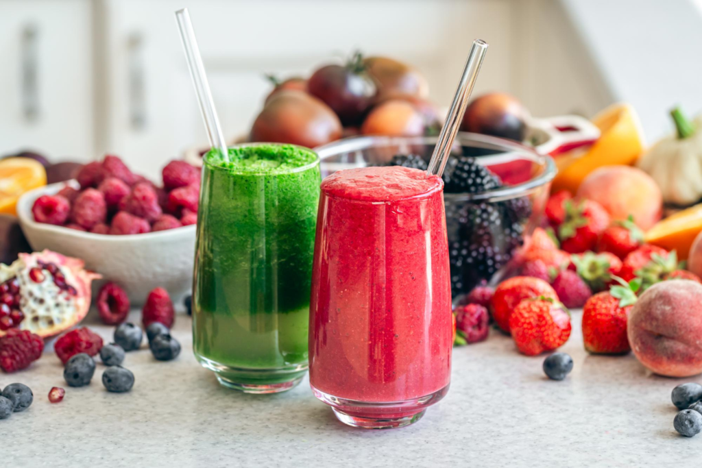 A glass of vibrant Just Juice Smoothie made with fresh fruits and no added sugar.
