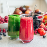 A glass of vibrant Just Juice Smoothie made with fresh fruits and no added sugar.
